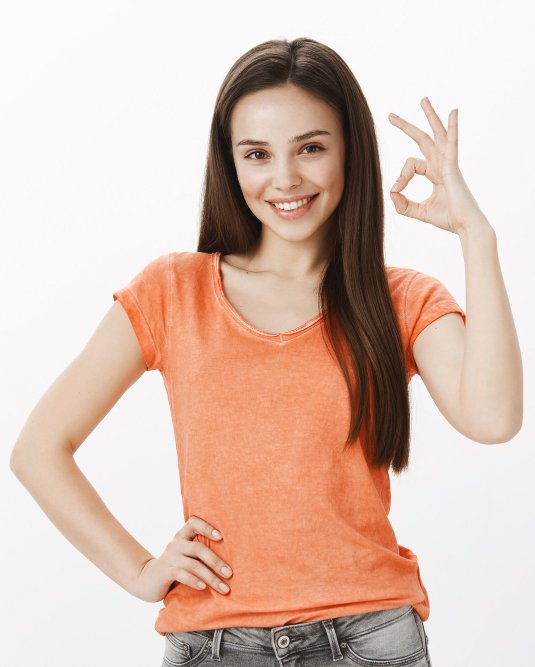 satisfied cheerful girl pretty woman showing approval gesture okay good guarantee quality like idea